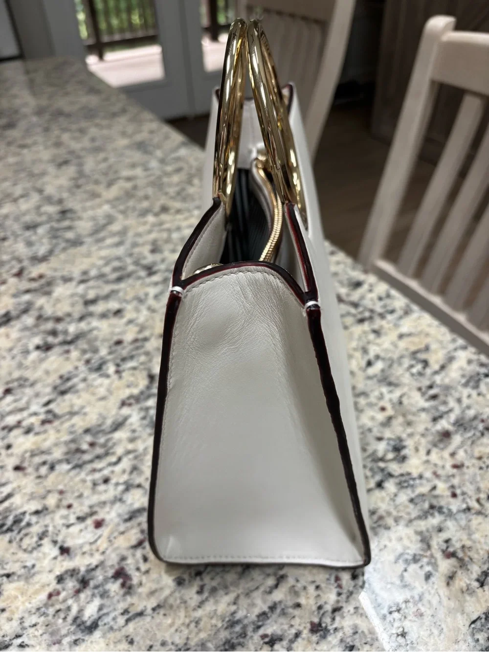 kate spade white leather bag with gold circular handle